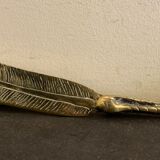Paper cup or old bronze letter opener, eagle claw shape