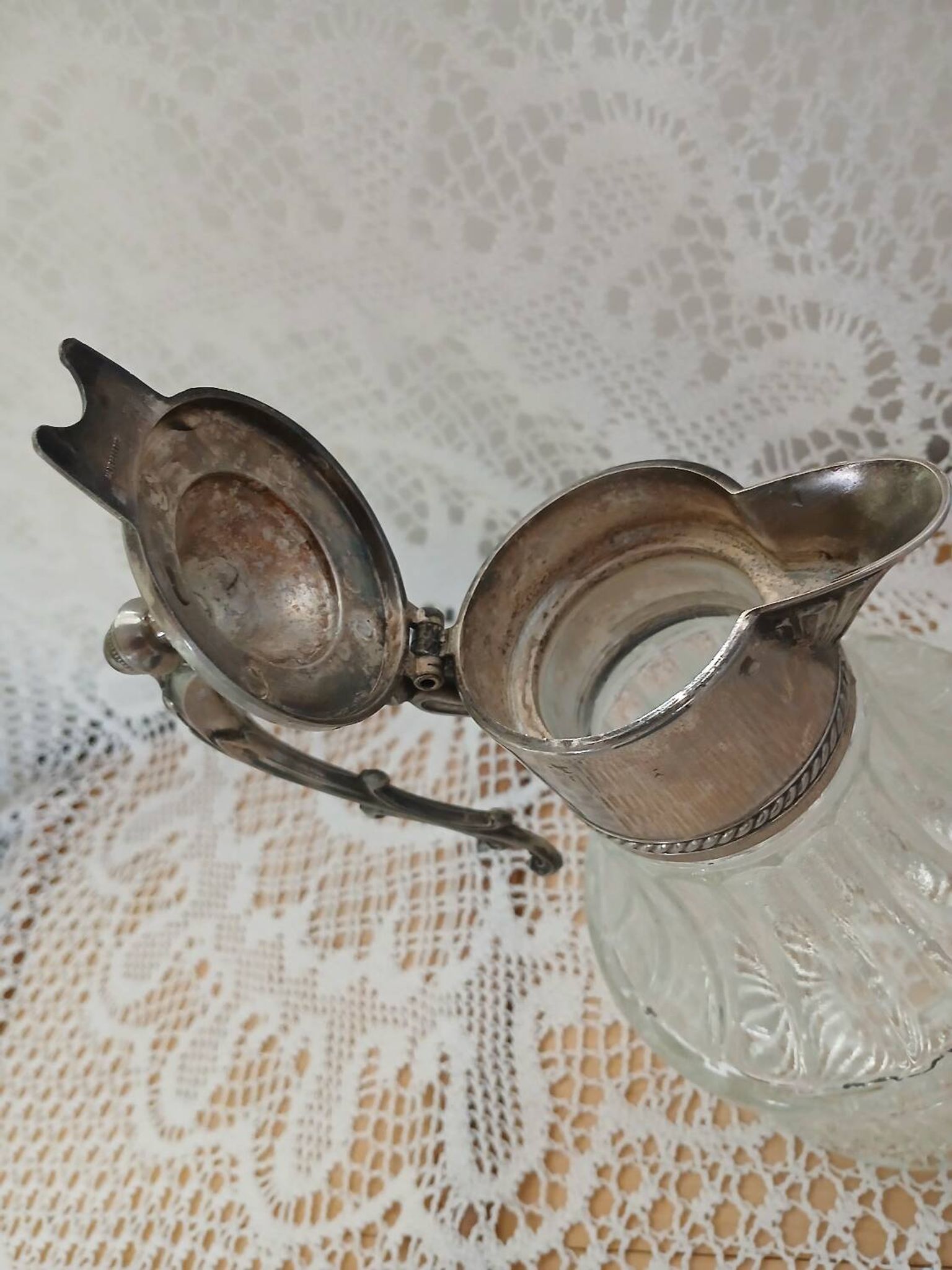 Antique pewter and glass carafe