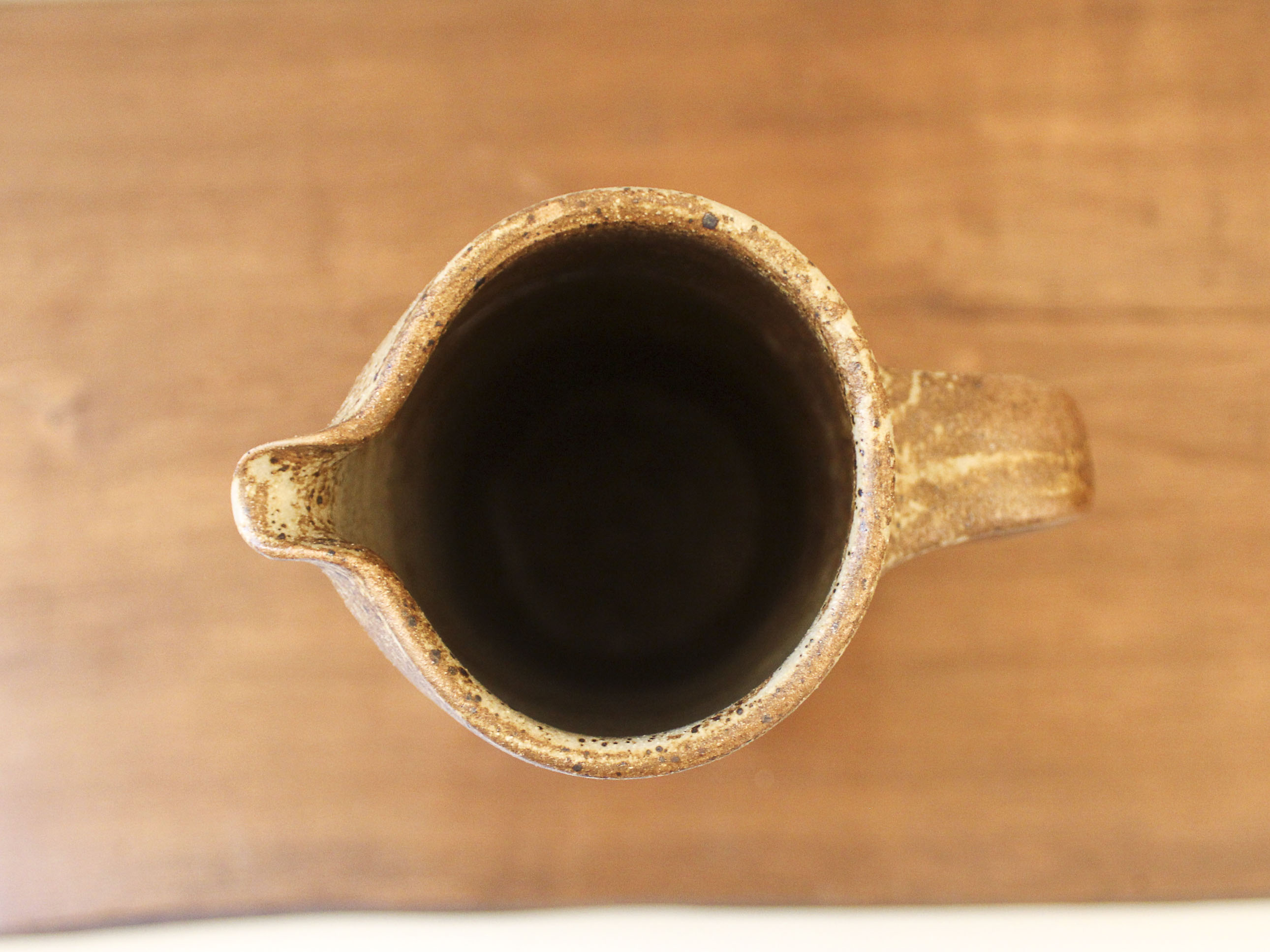 Pitcher in sandstone pyrity signed