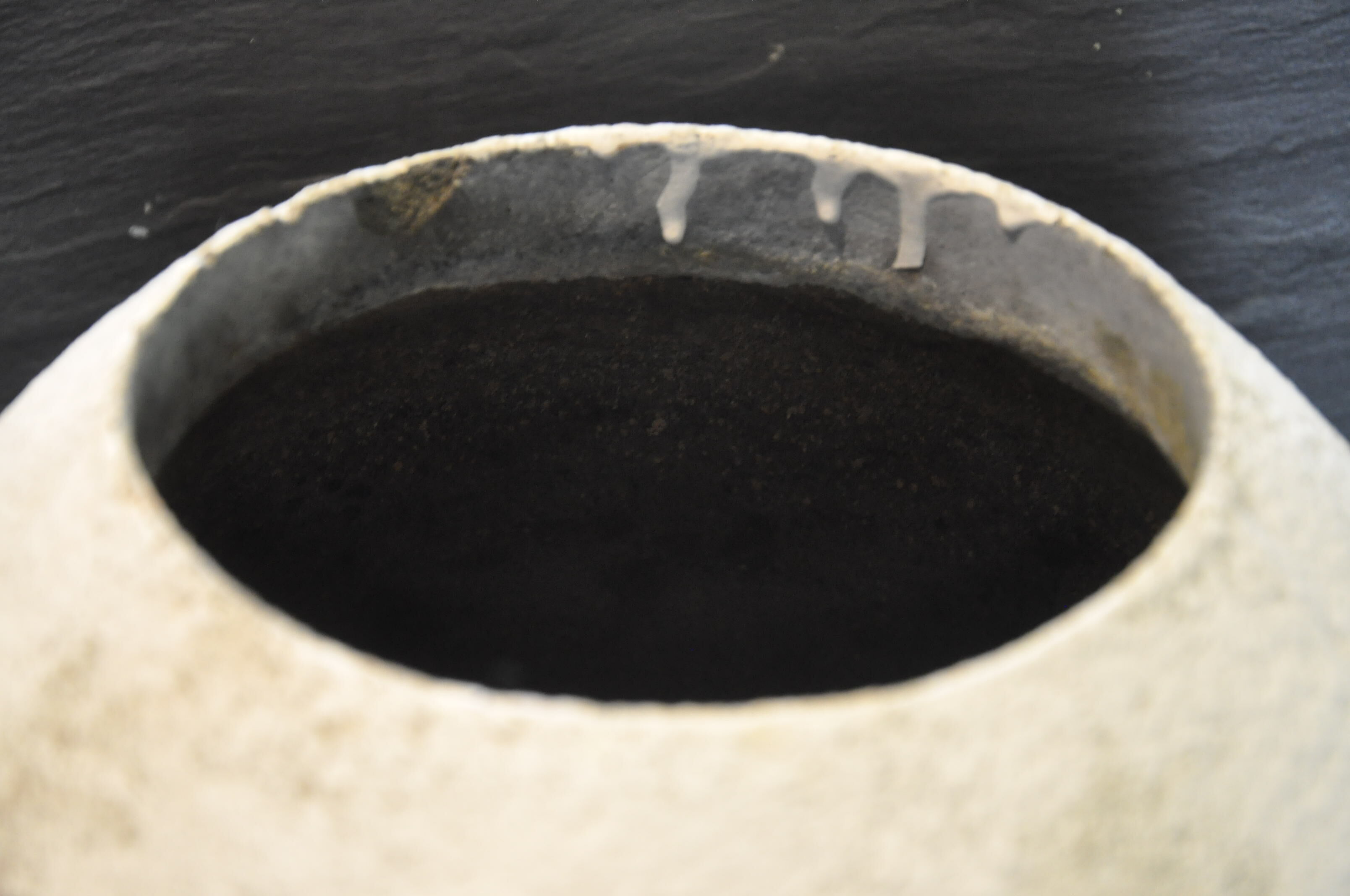 Cement ball planter from the 1960s