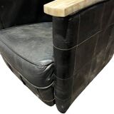 Pair of leather armchairs with marquetry armrests