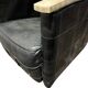 Pair of leather armchairs with marquetry armrests