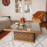 Square table in woven chestnut, with glass top