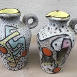 Pair of Marius Bessone vases, pitchers