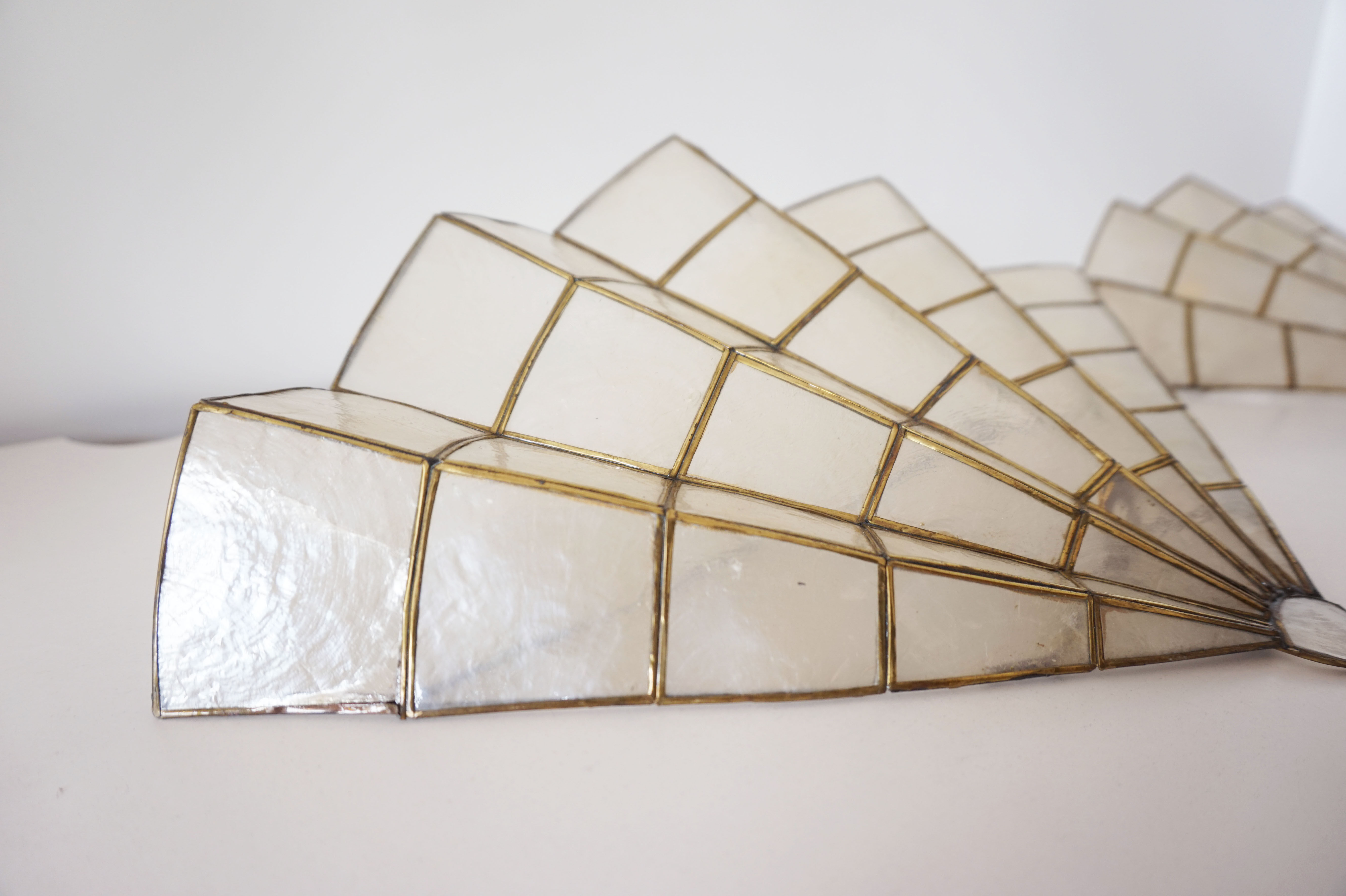 Pair of mother-of-pearl fan-shaped sconces