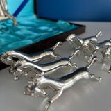 Set of 6 vintage silver metal knife holders and bottle opener, chev design