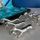 Set of 6 vintage silver metal knife holders and bottle opener, chev design