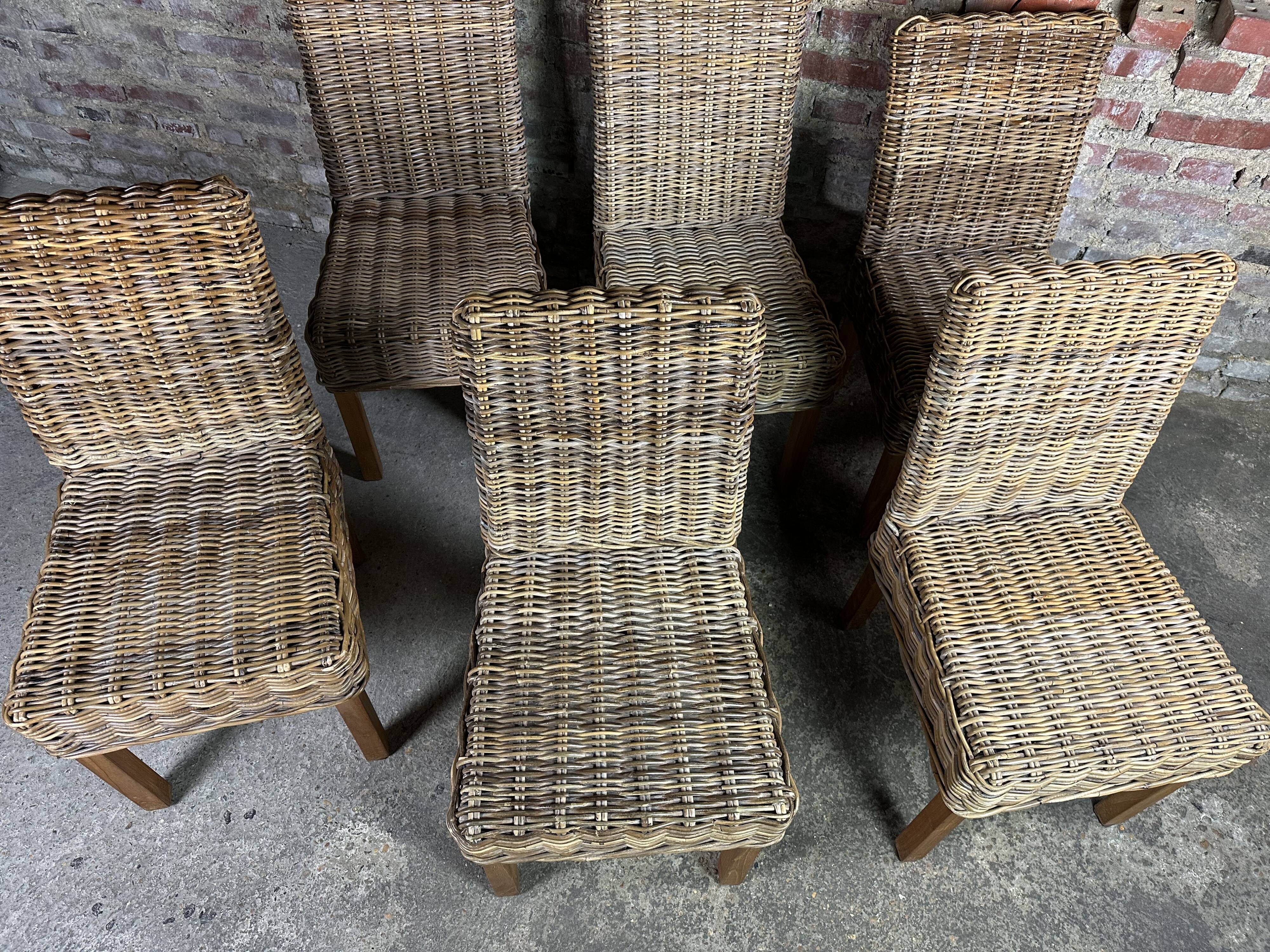 Chairs in wood and woven rattan