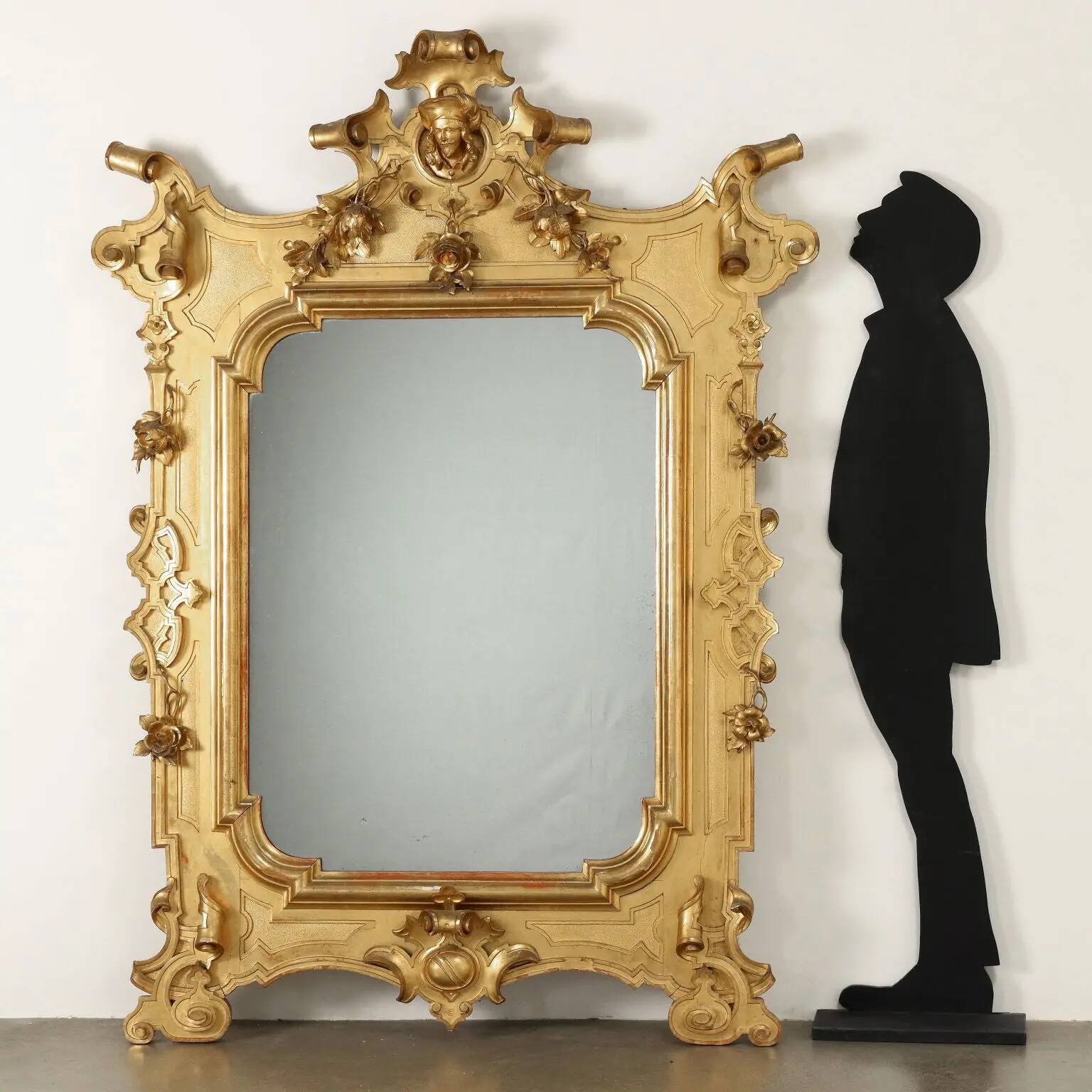 Large antique umber pine mirror from Switzerland, Italy, 19th century.