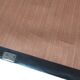 Vintage 1960s secretary desk with an angled design, light wood, and tapered legs.