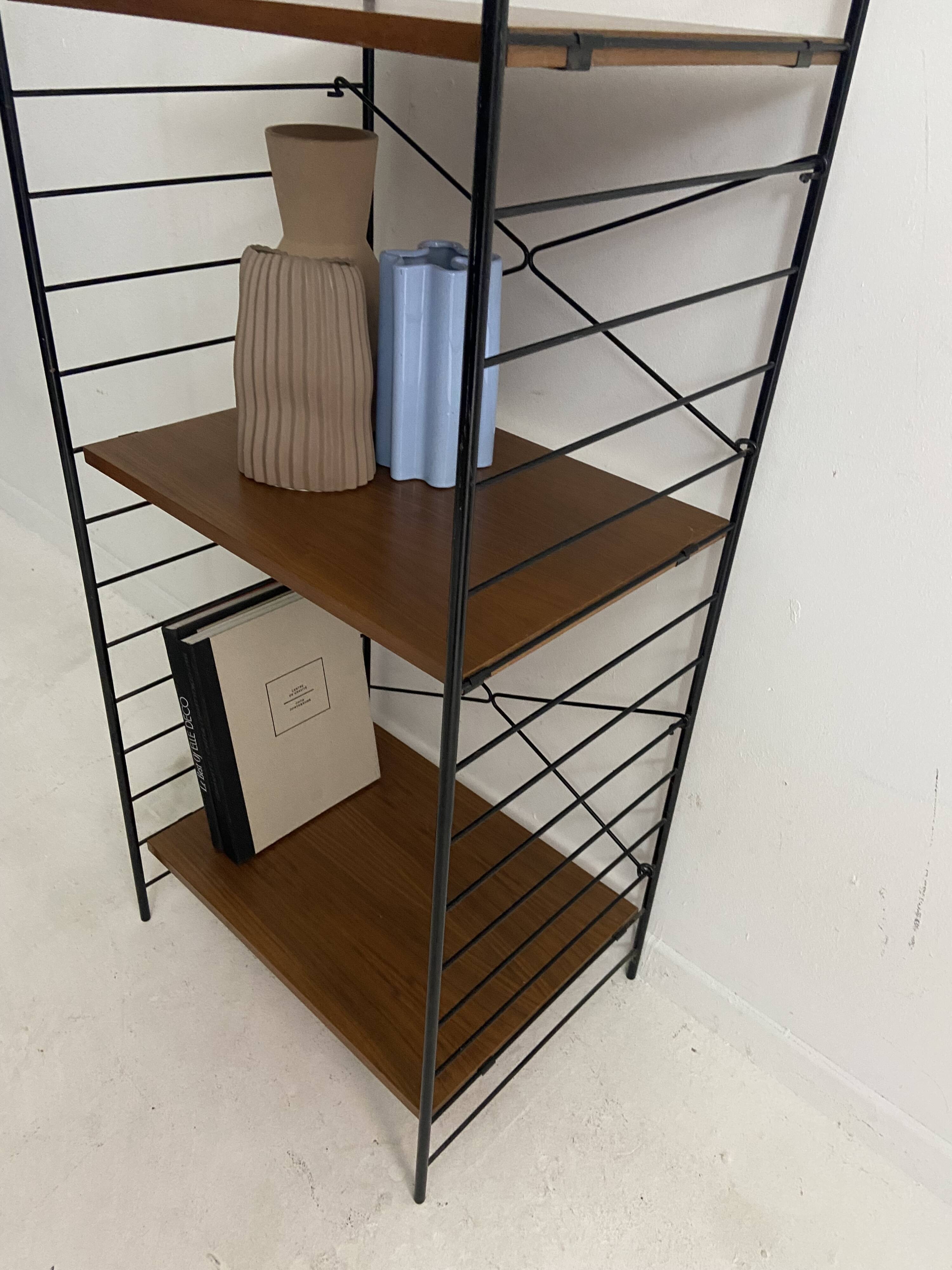 small vintage metal and teak string bookshelf