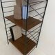 small vintage metal and teak string bookshelf