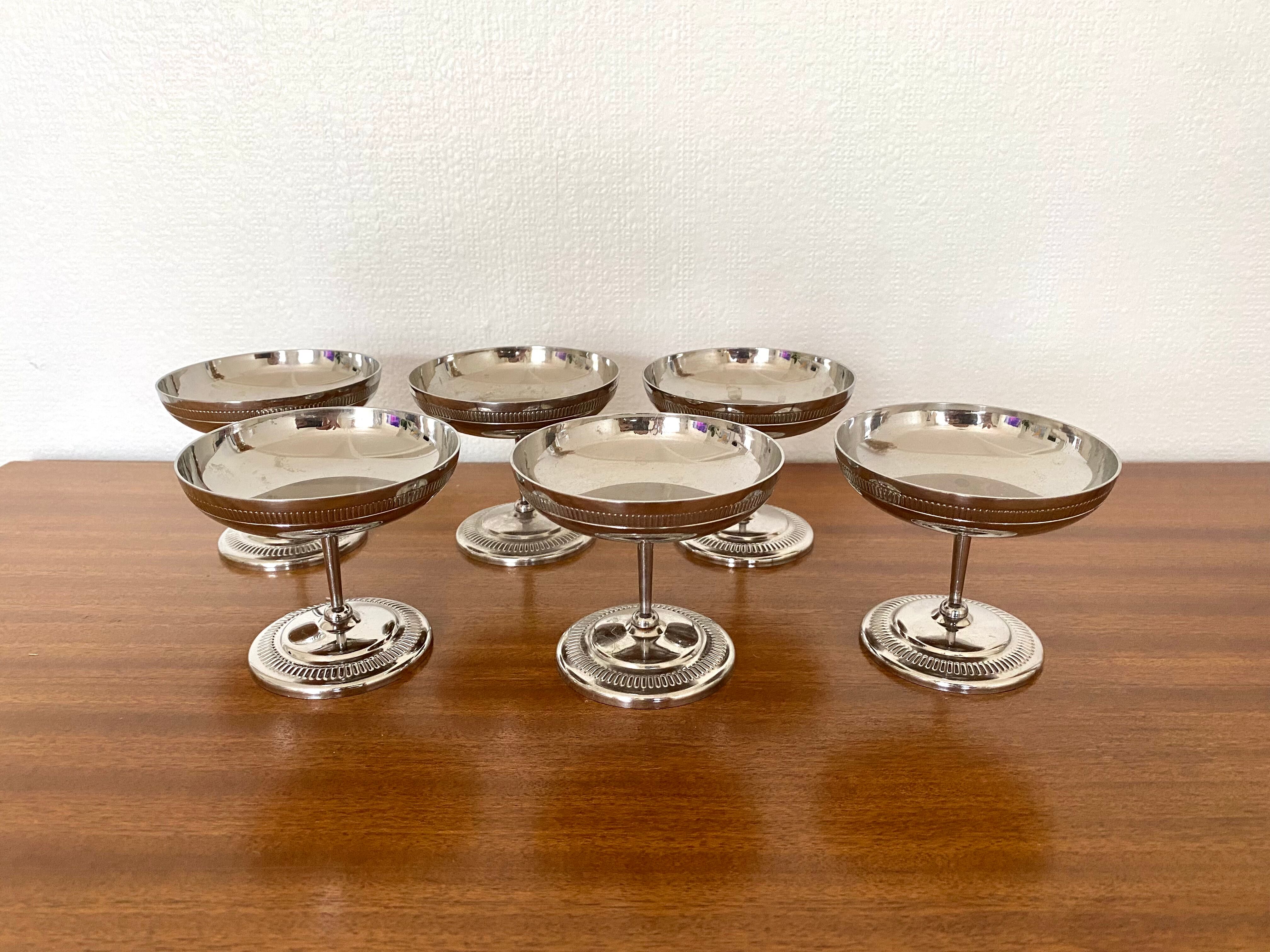 Old silver metal standing ice cups