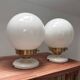 Pair of wall sconces with white opaline globes