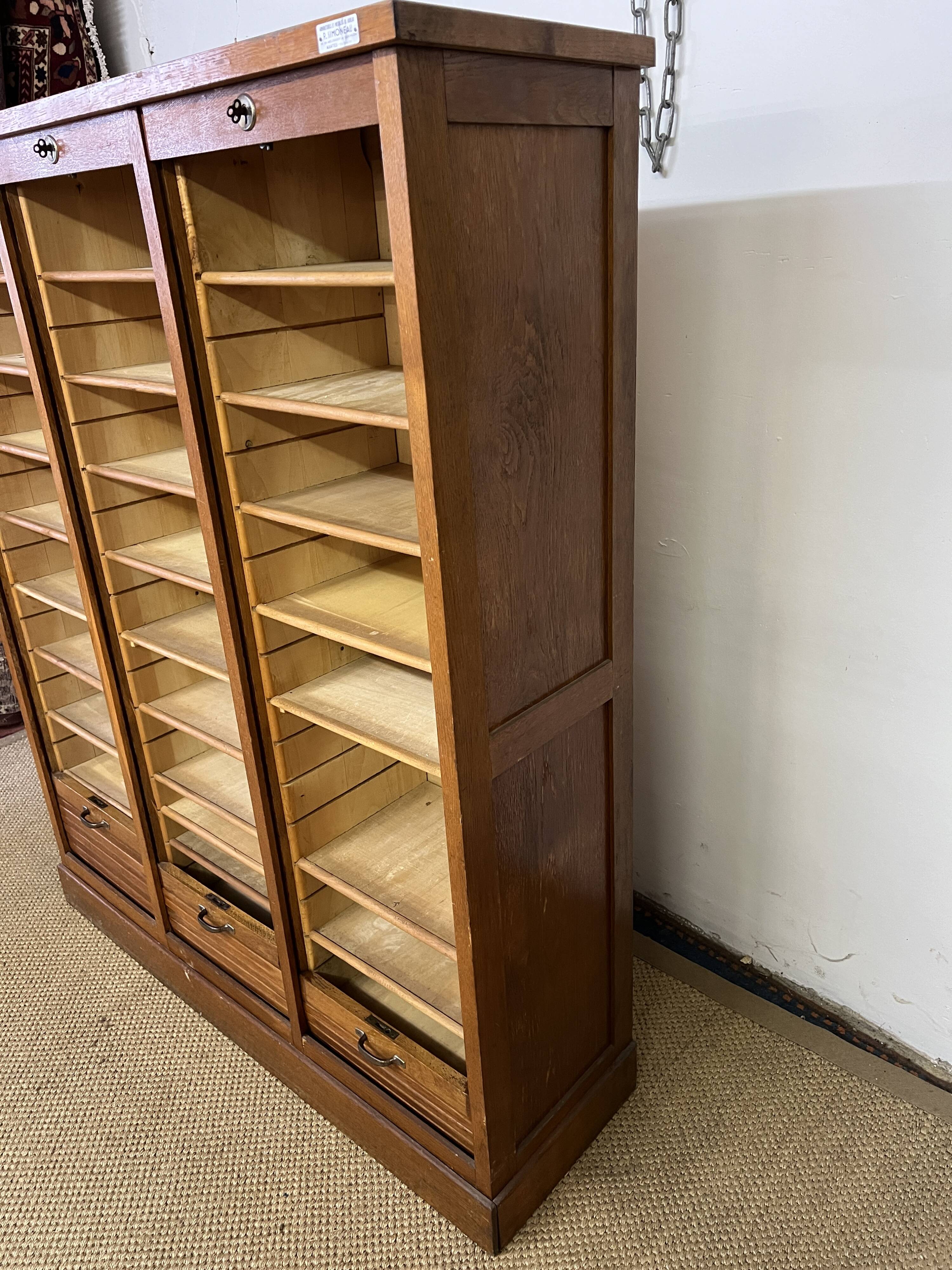 Old filing cabinet with triple curtains