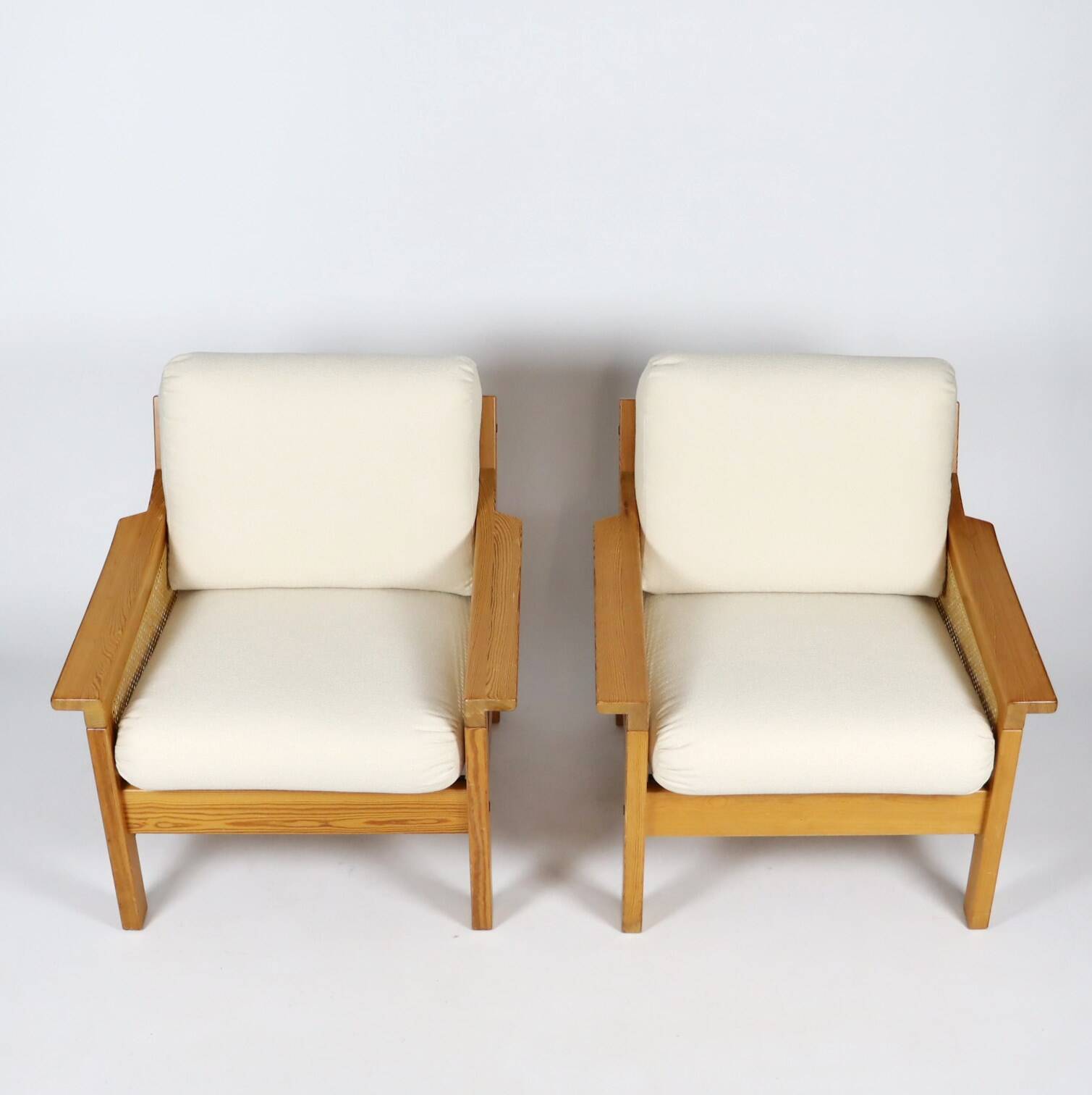 Pair of 70s cane and pine armchairs