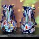 Pair of antique millefiori glass vases attributed to Murano with 2 handles.