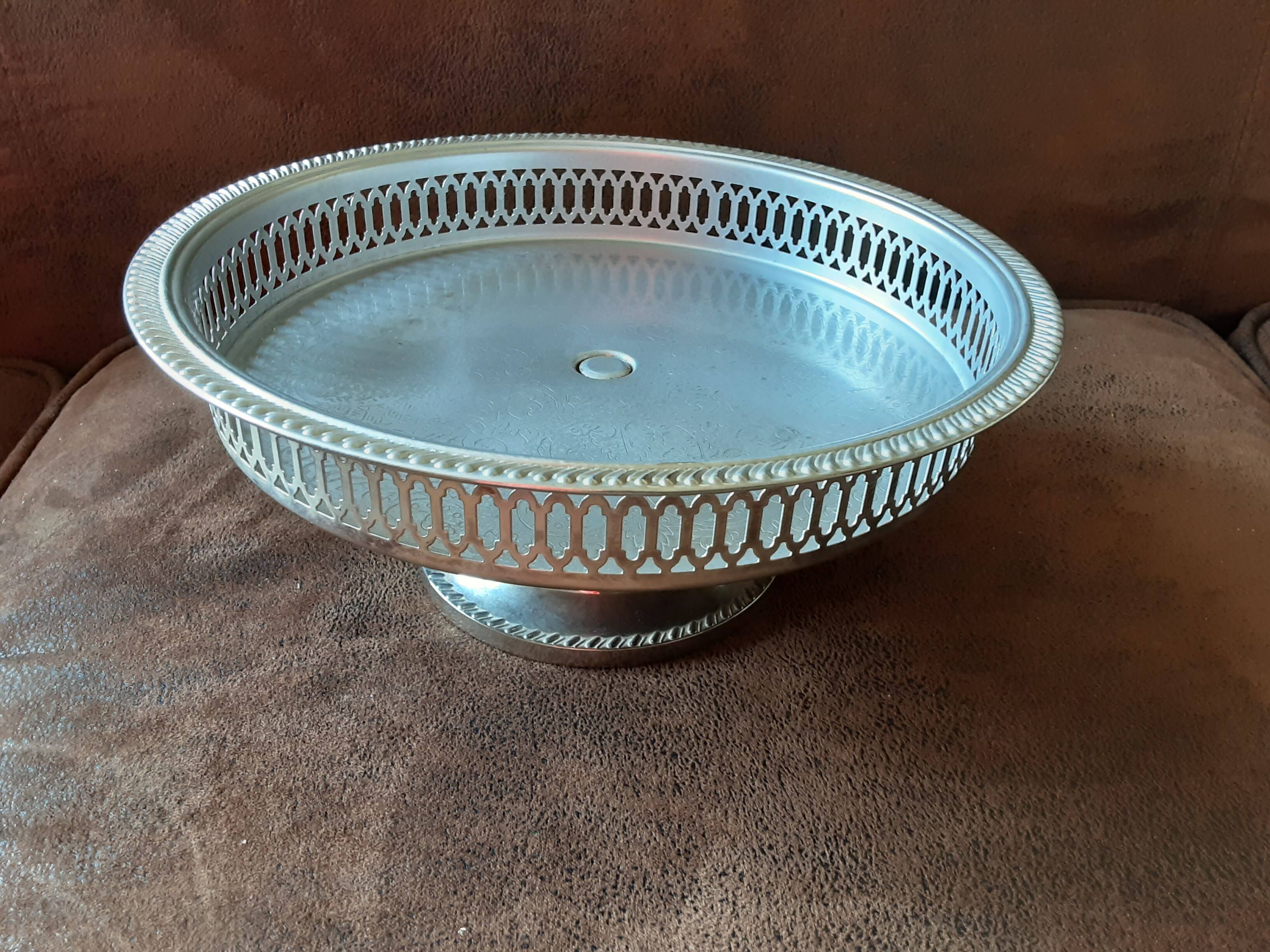 Old metal bowl on foot