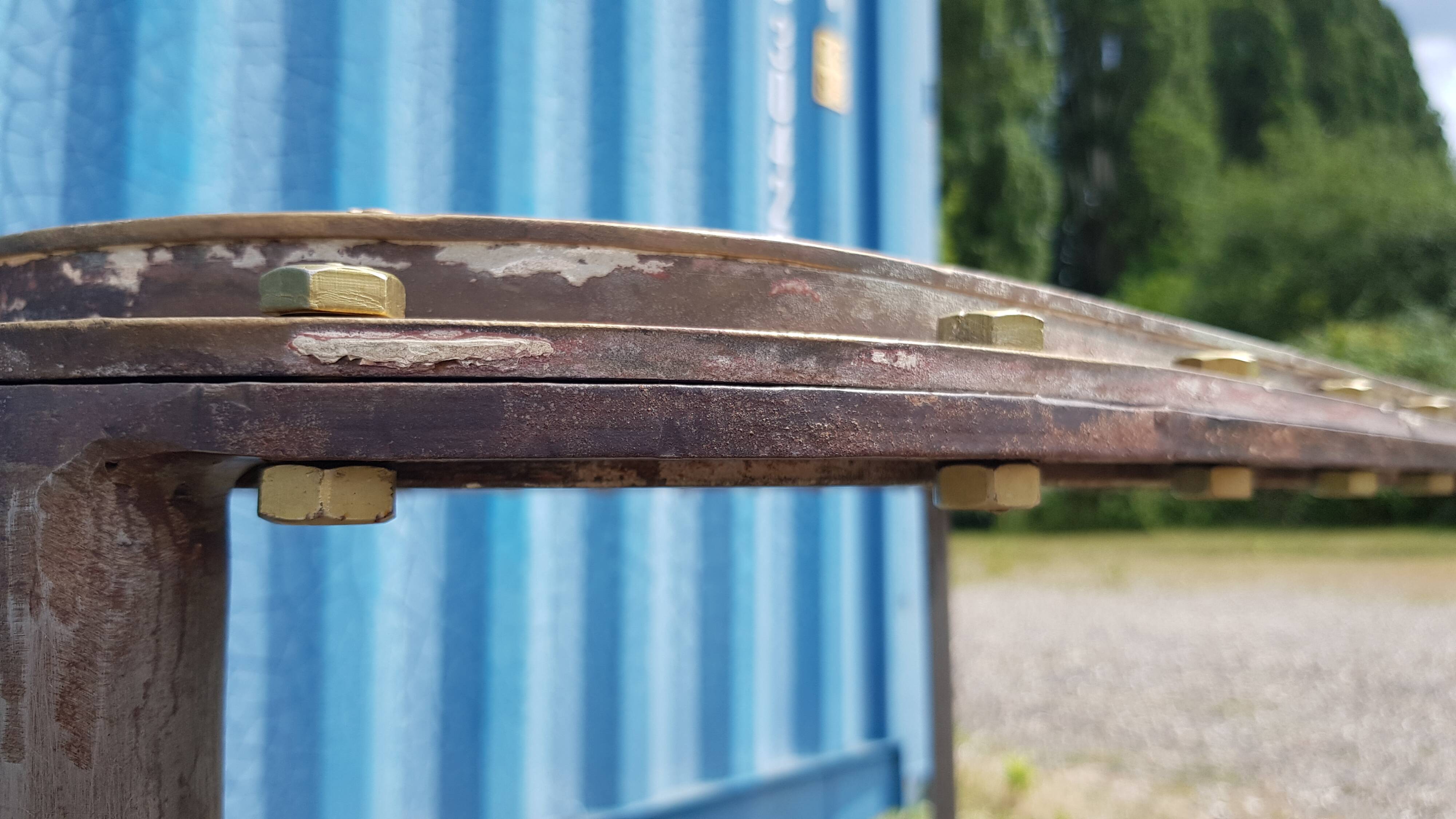 Table with an old ship porthole in brass and a metal base / 110 x 70 x 76 cm