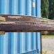 Table with an old ship porthole in brass and a metal base / 110 x 70 x 76 cm