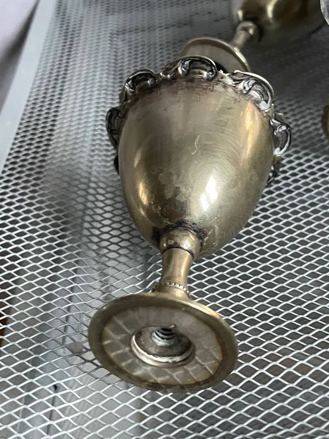 Antique egg set in nickel silver metal