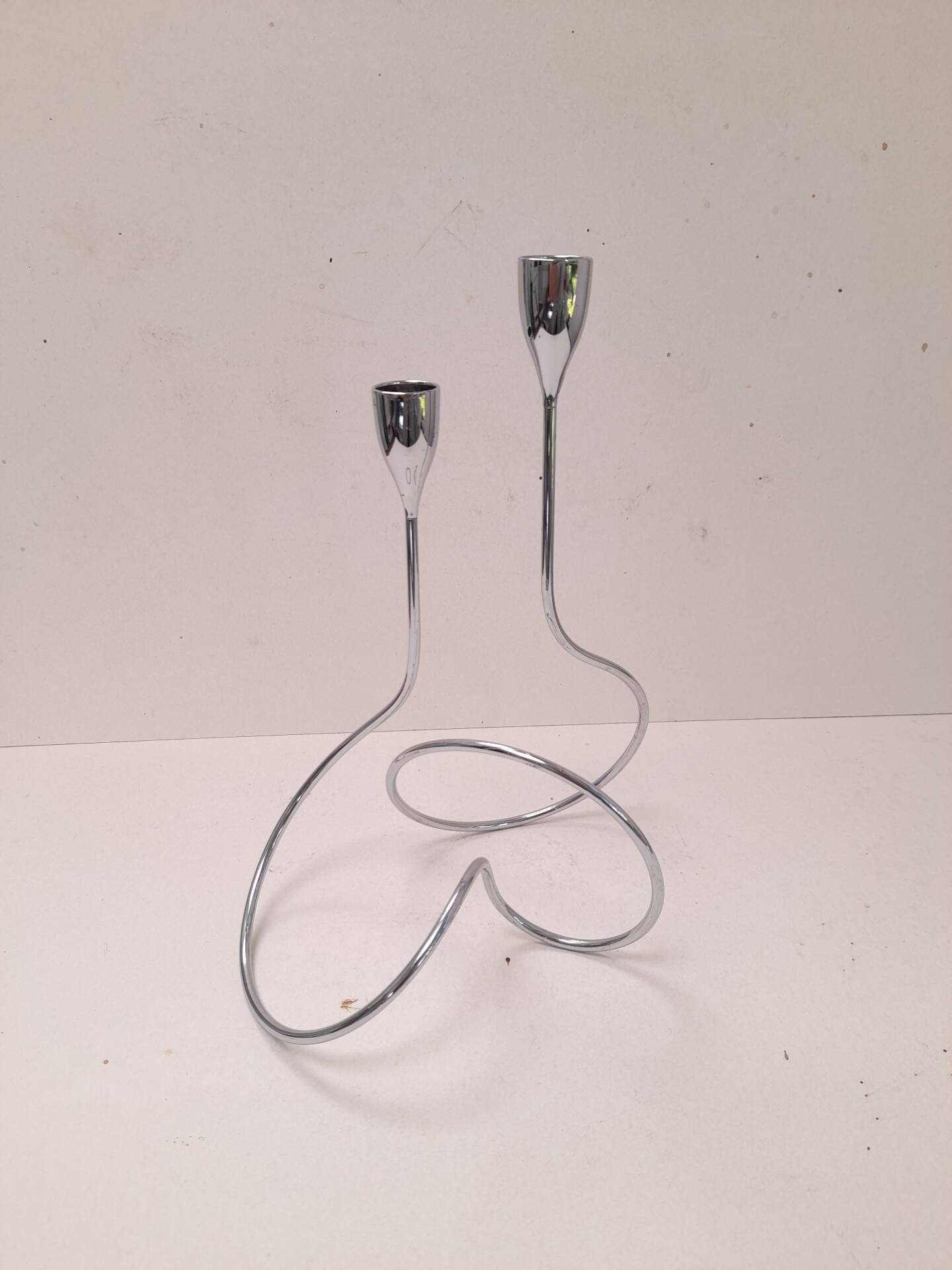 Curved chrome candlestick Black+Blum