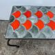 Ceramic coffee table with scales from the 1950s.