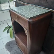 Art Deco bedside table with a green marble top.