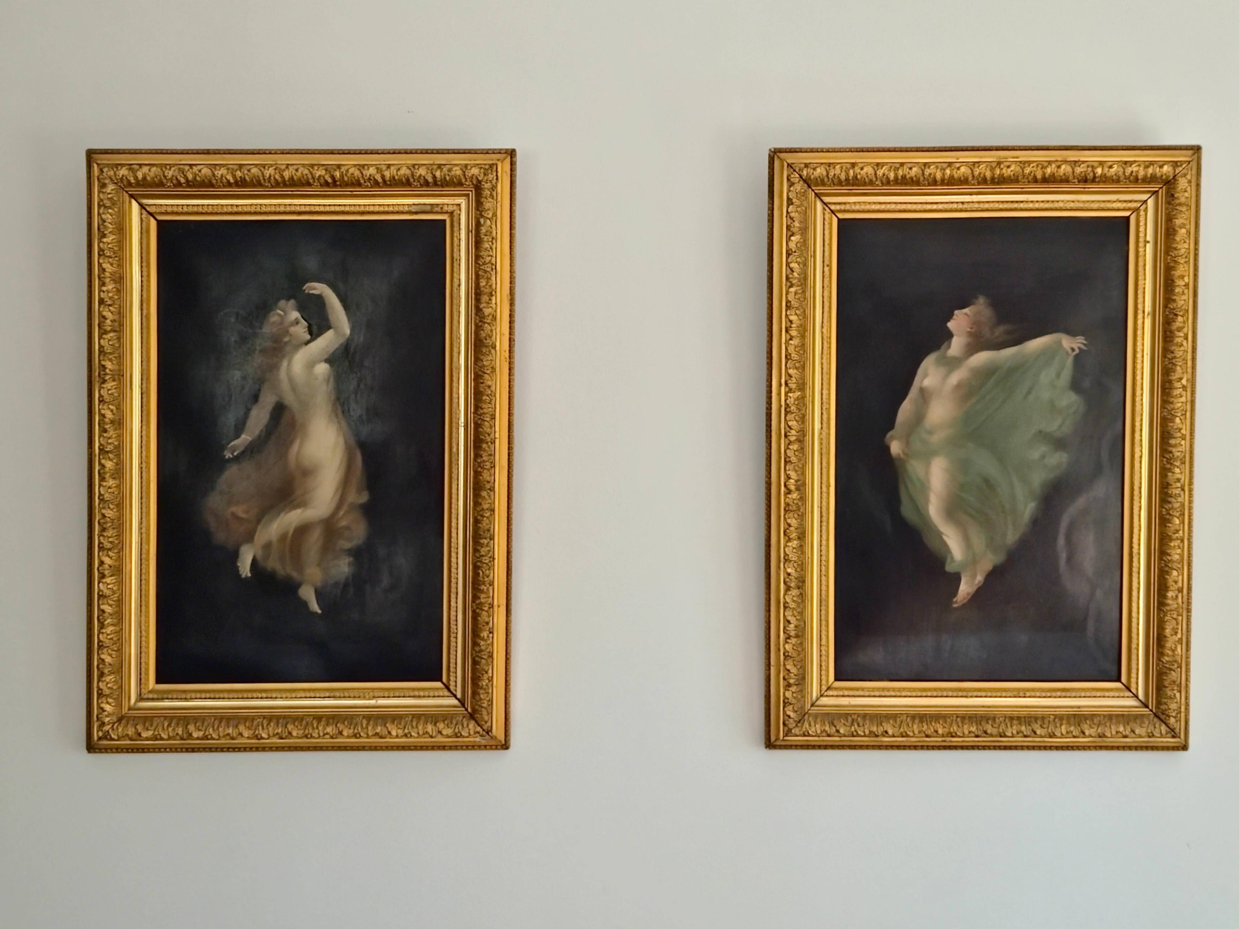 Pair of oil paintings in the neoclassical style depicting dancing nymphs dressed in transparent gowns, dating from the mid-19th century.