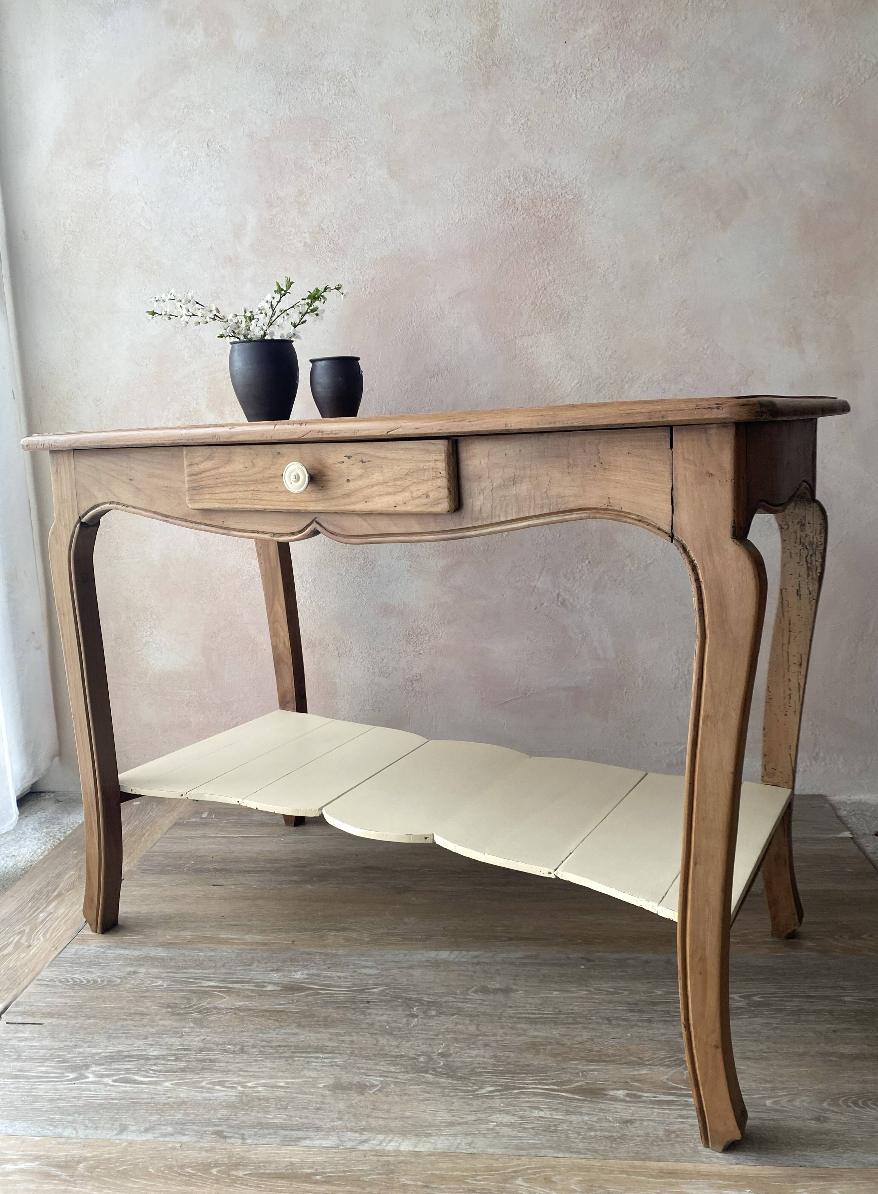 Antique console in solid cherry wood in Louis XV style.