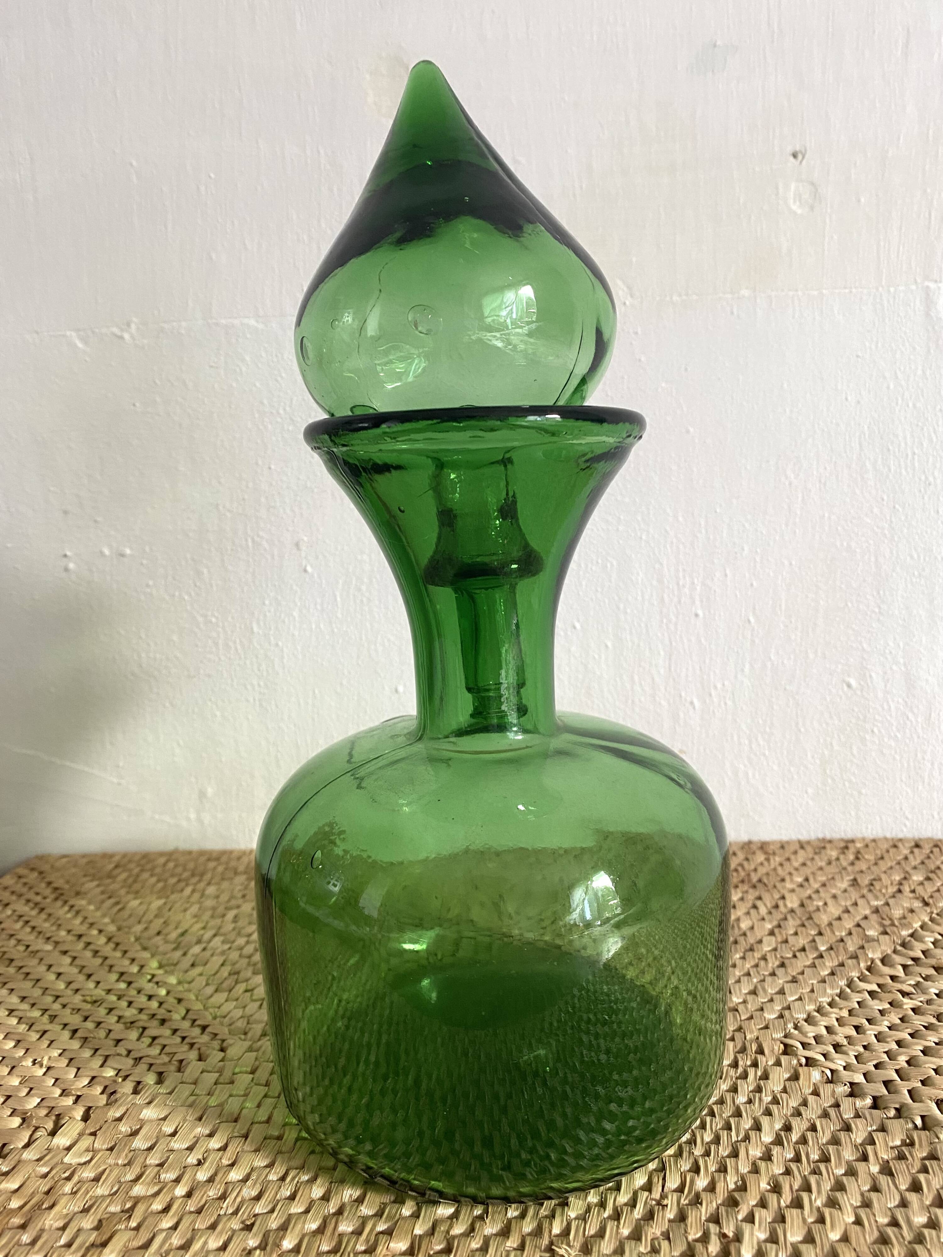 Vintage carafe in tinted green