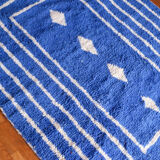 Klein blue and white Moroccan Berber rug