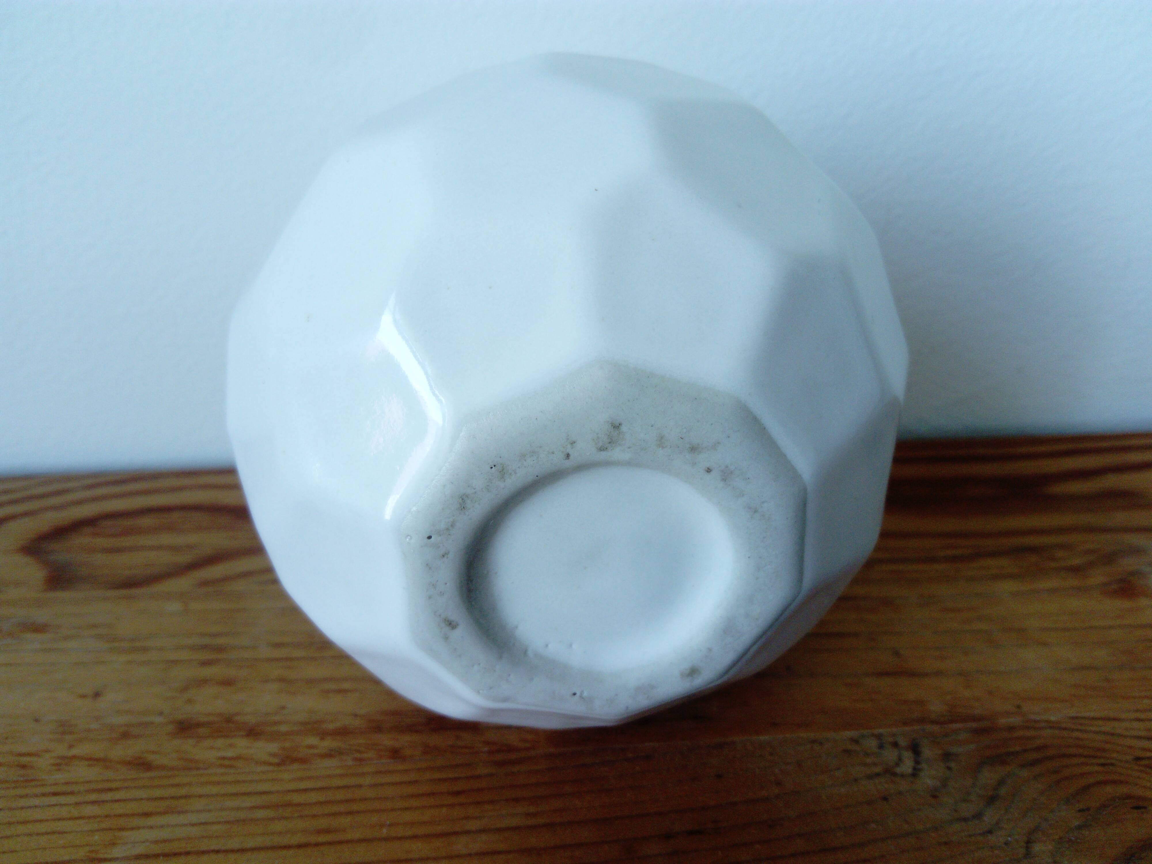 white ceramic faceted design vase
