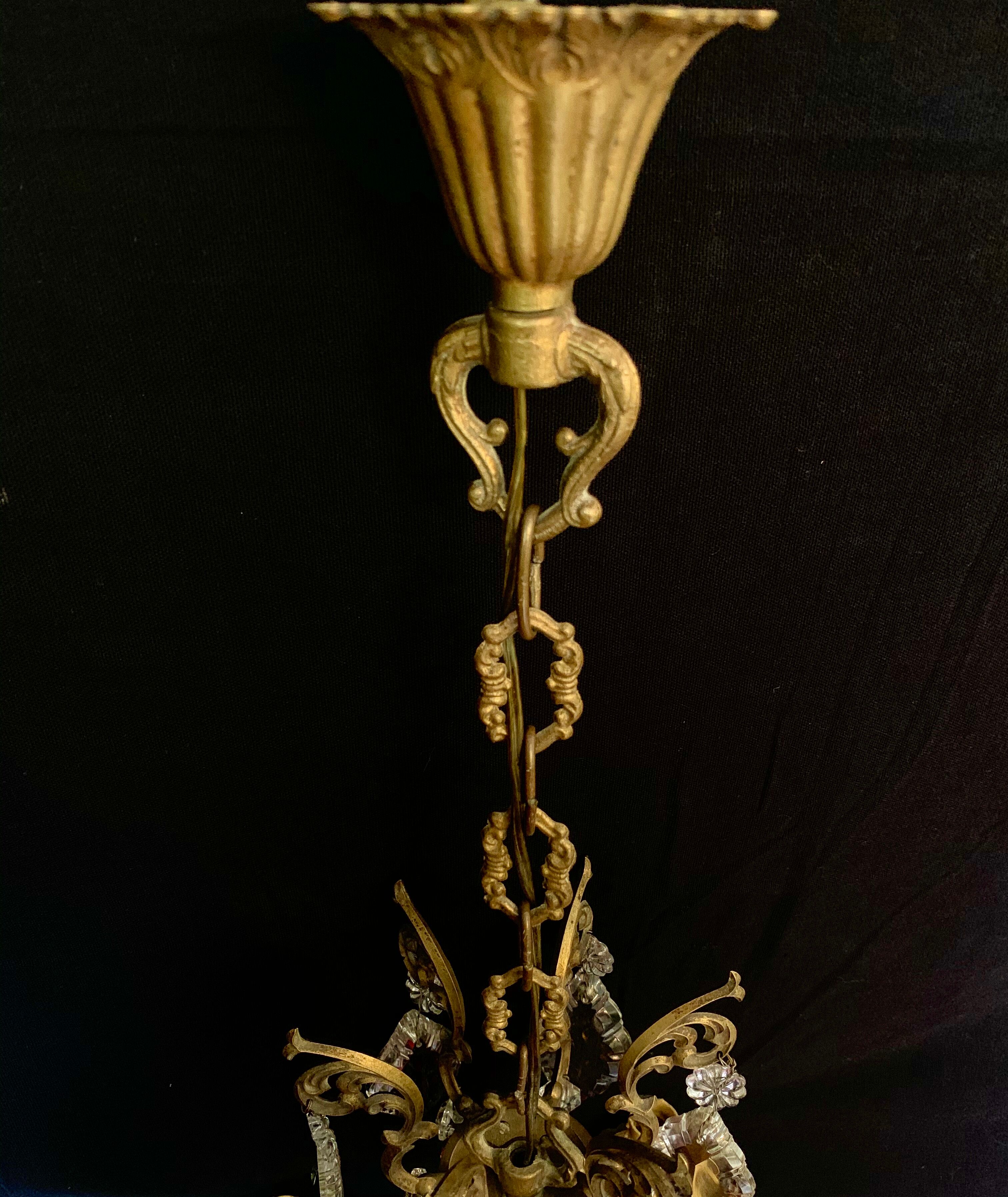 4 bronze lights and tassels chandelier