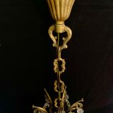4 bronze lights and tassels chandelier
