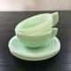 Pair of almond green opaline cups