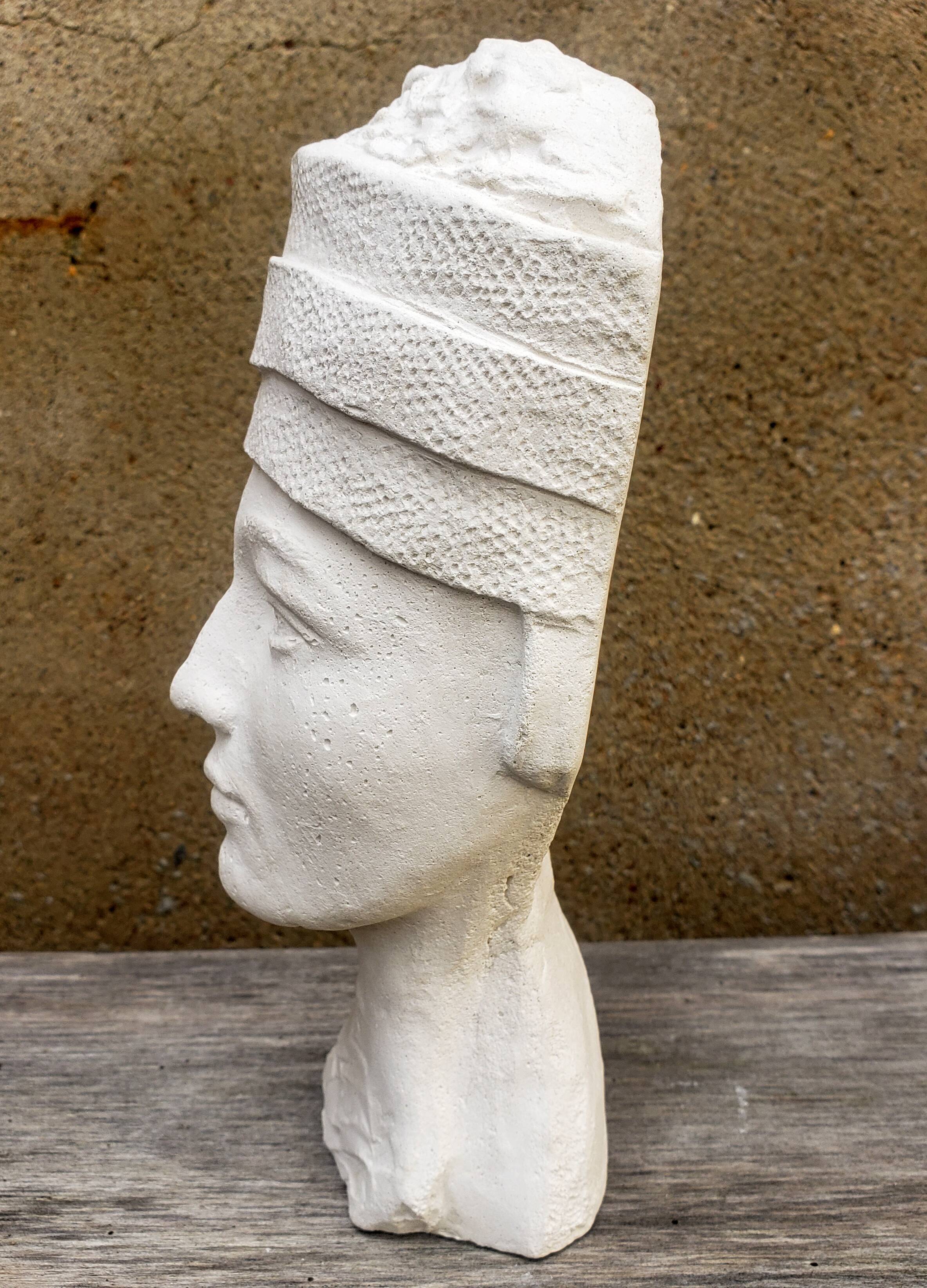 Young girl bust in plaster