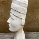 Young girl bust in plaster