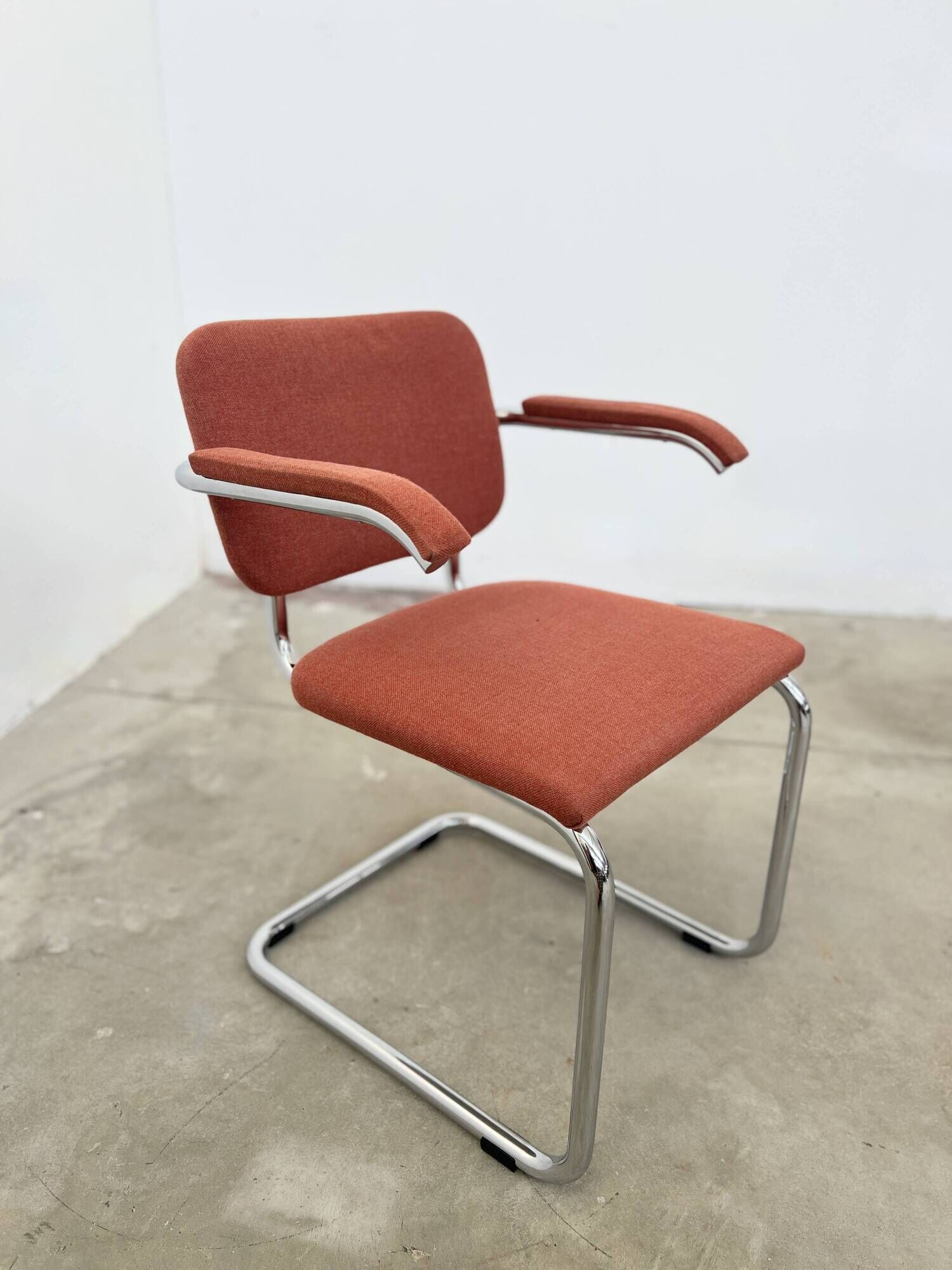 Pair of Marcel Breuer B64 Knoll armchairs in coral fabric