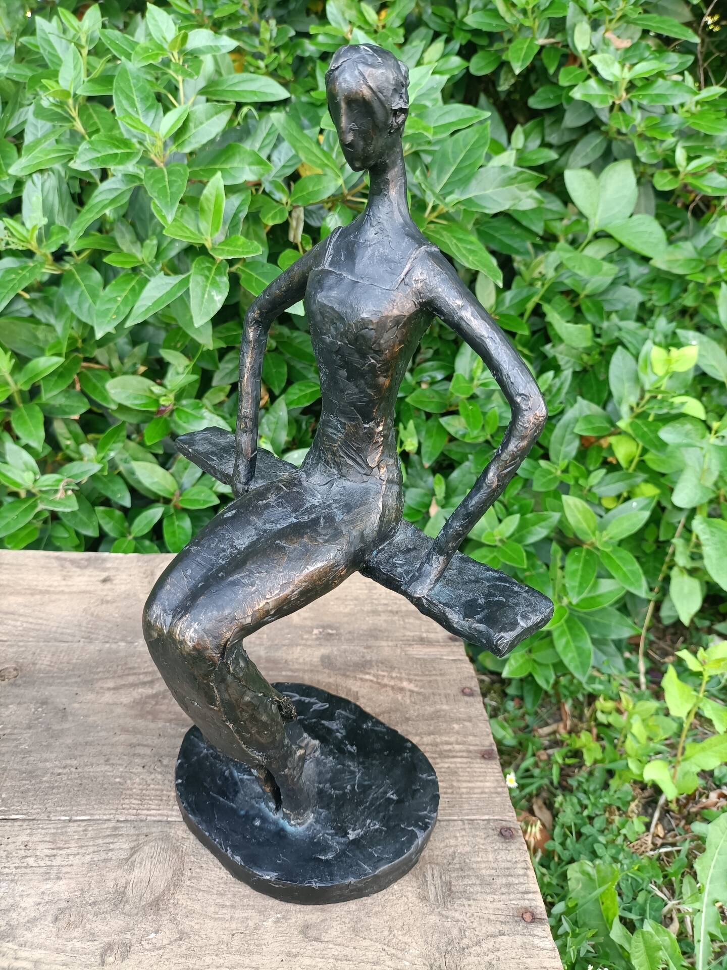 Sculpture of a dancer on a swing signed by Raphaël