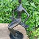 Sculpture of a dancer on a swing signed by Raphaël