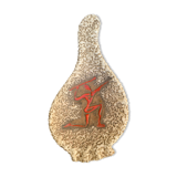 Glassed ceramic cut enamelled prehistoric warrior motif vintage red 1950