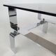 Table basse métal chromé et verre fumé 70
