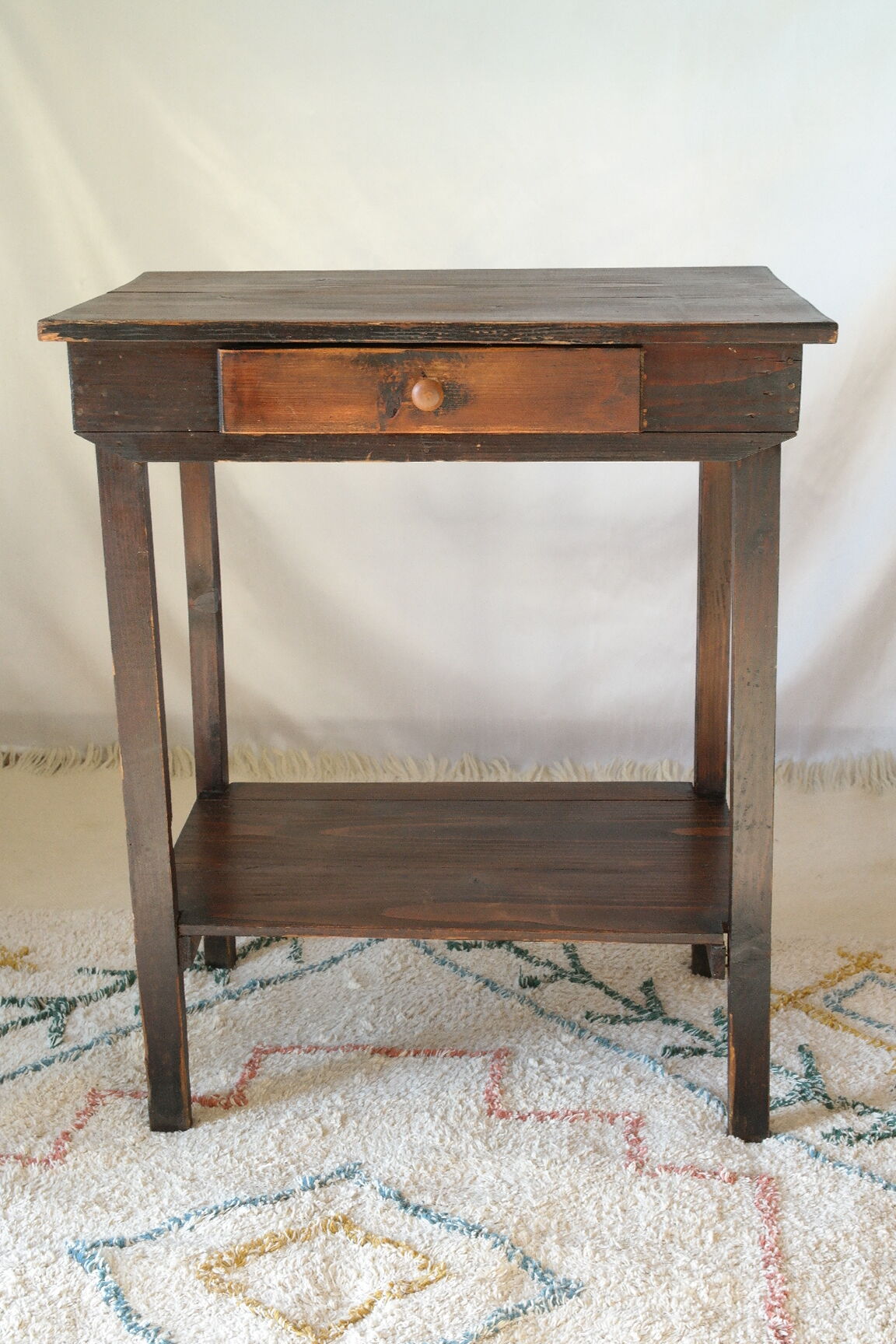 Old country side table in waxed wood
