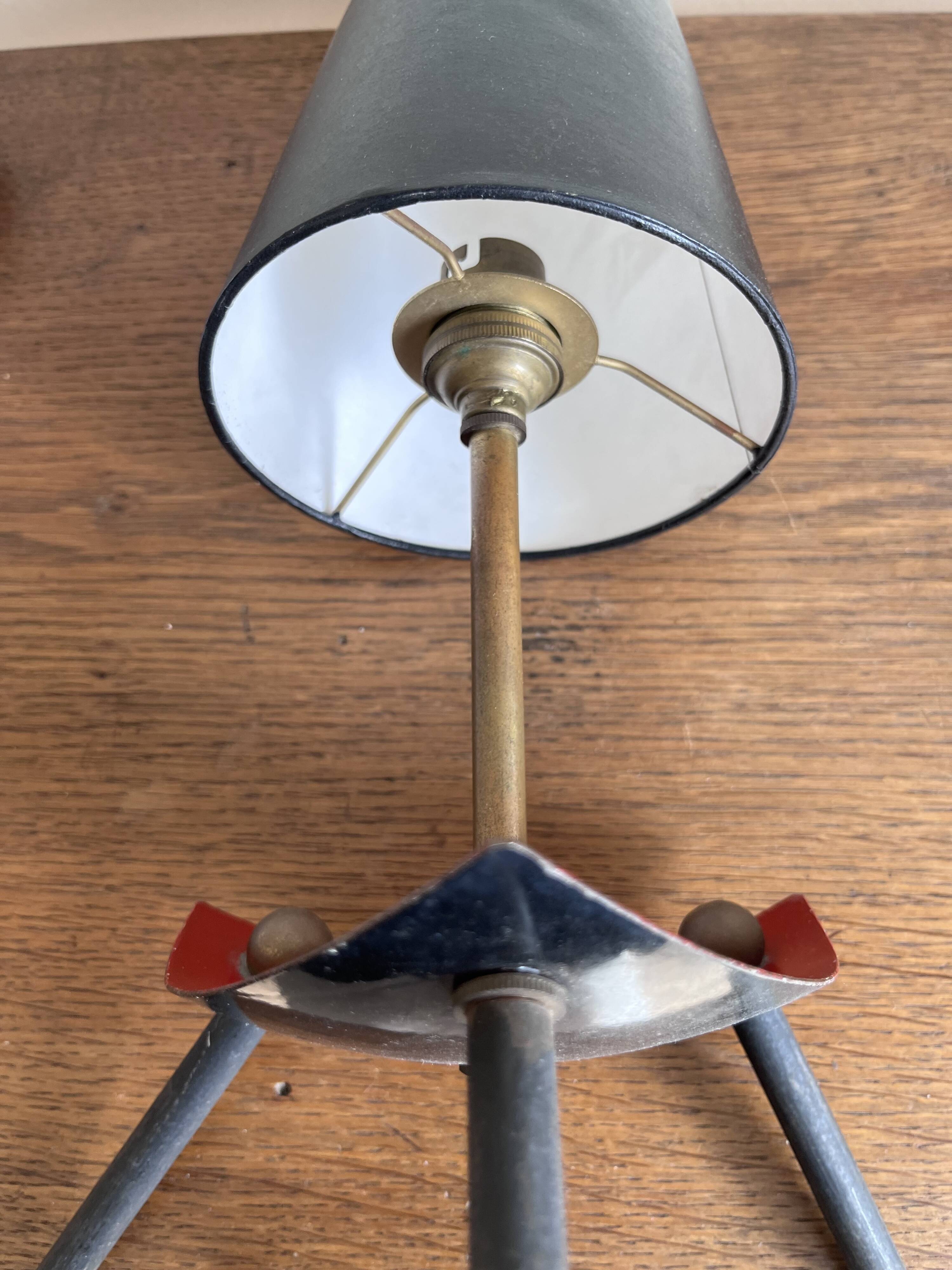 1950s modernist tripod lamp made of sheet metal and brass.
