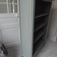 Louis XV style bookcase, green gray with 3 adjustable shelves, wooden tray.