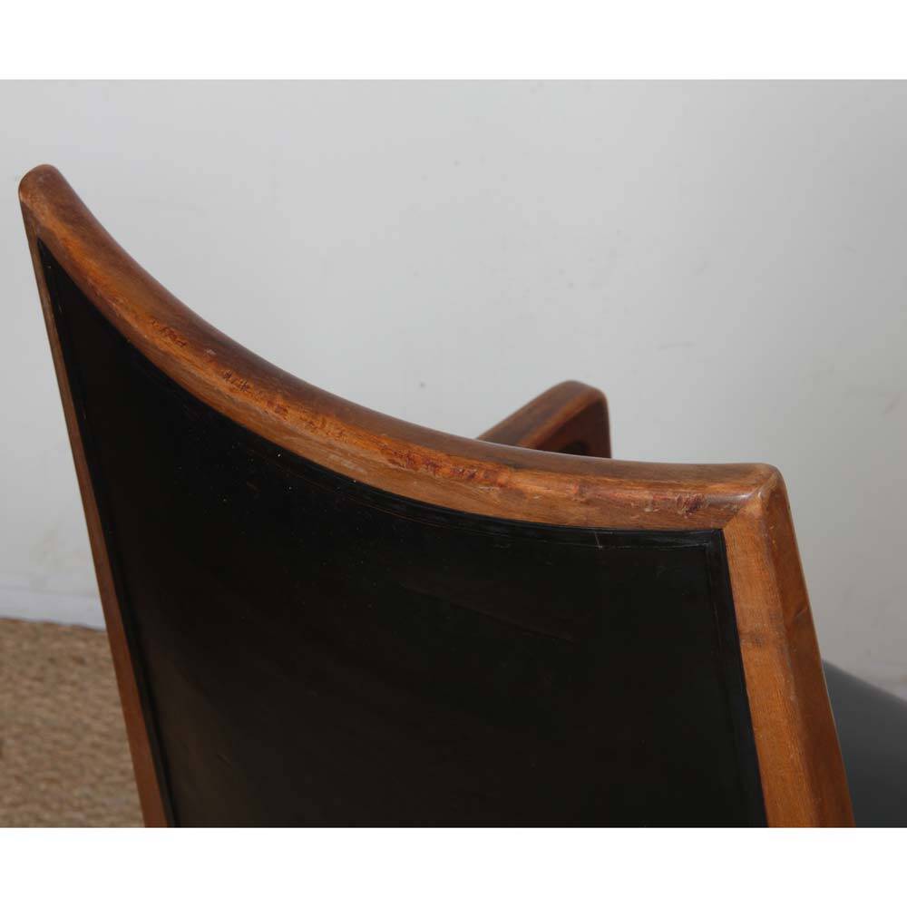 Pair of vintage wooden and leather armchairs from the 1950s.