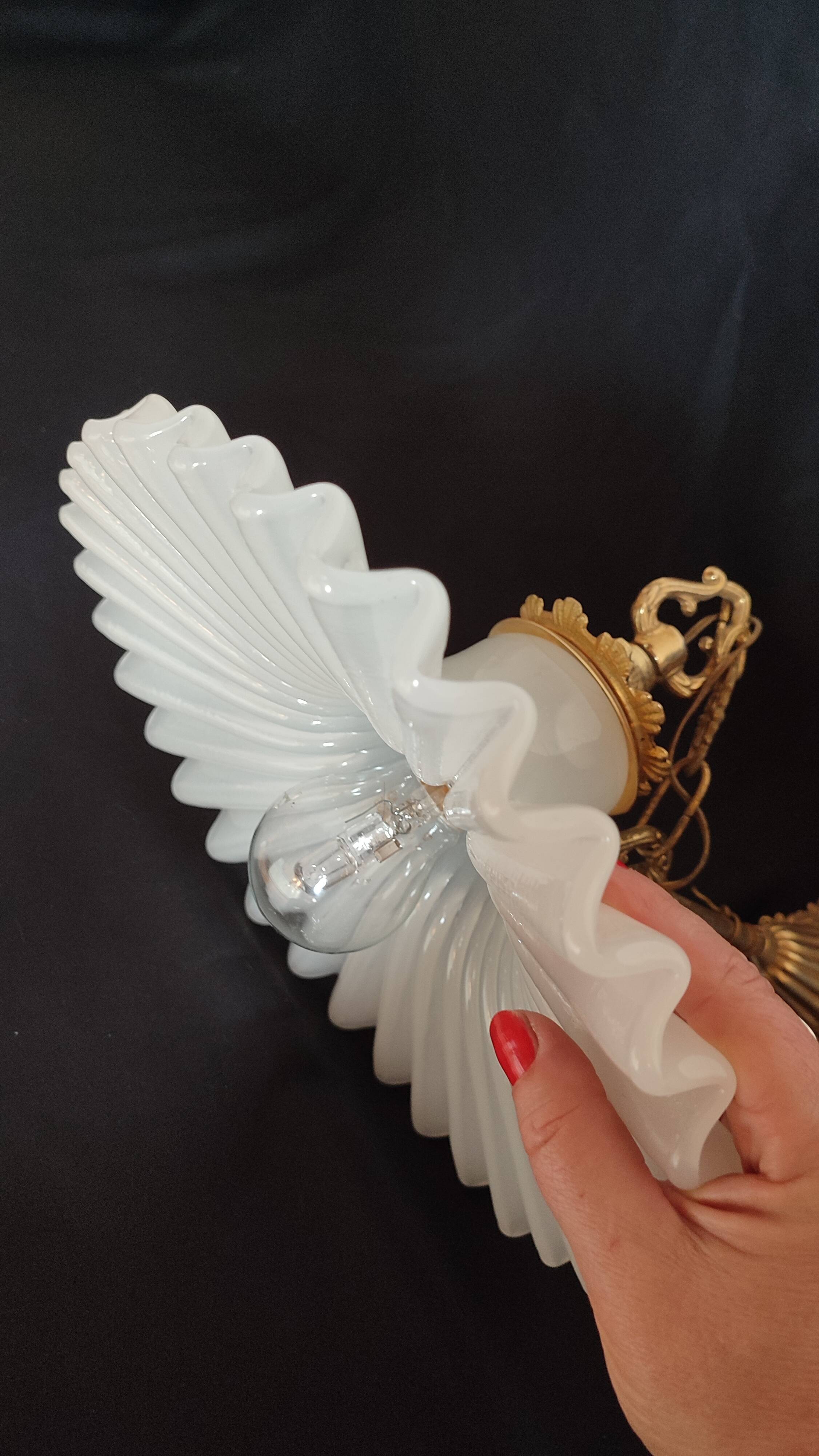 Round pendant light in pleated semi-opaque glass