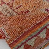 2x12 shades of pale orange vintage runner rug