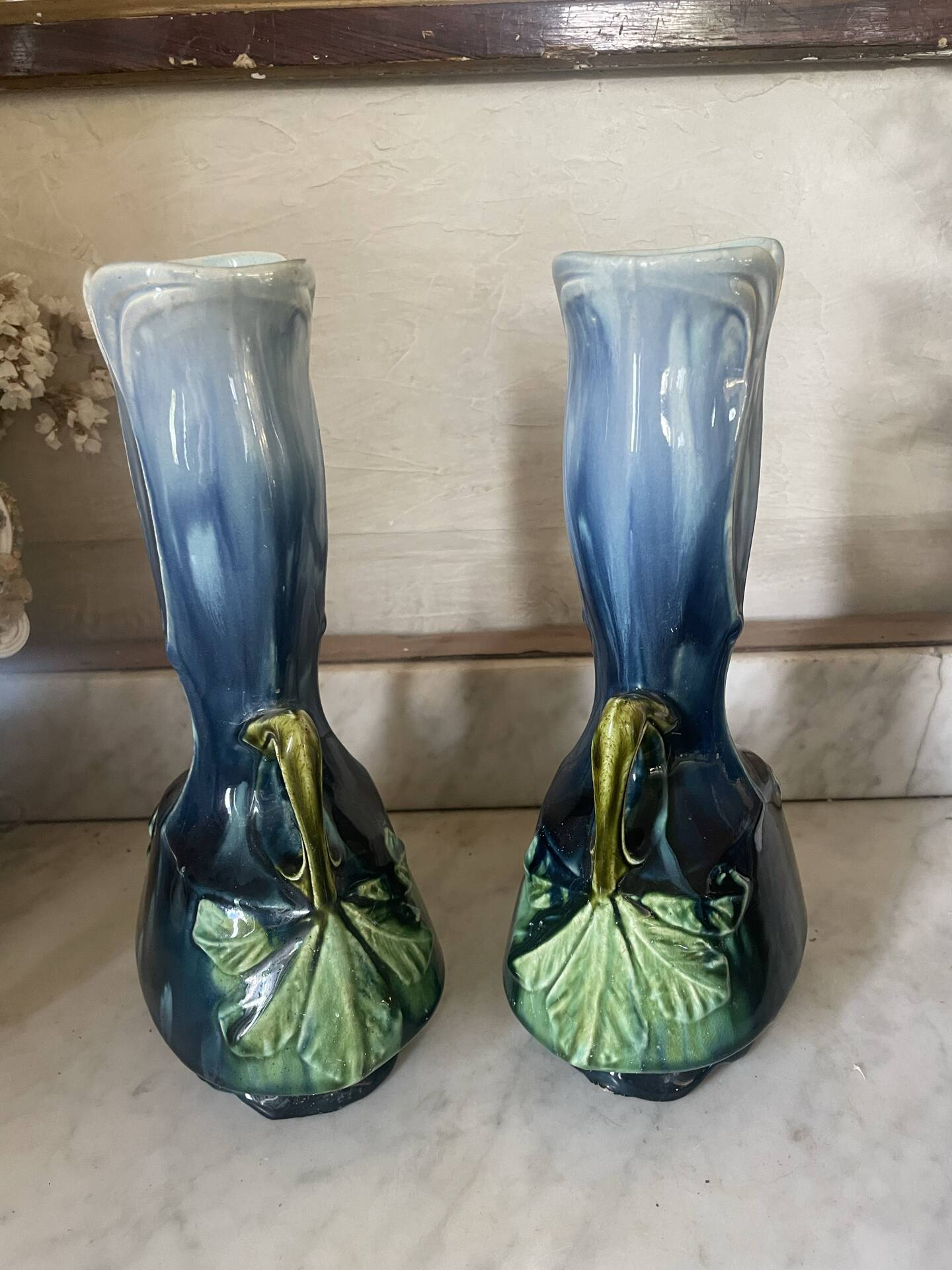 Pair of vases in slipware with Art Nouveau floral decoration.